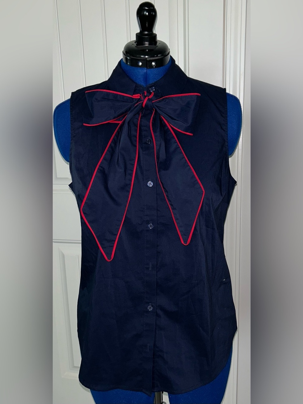 New York & Company Sleeveless Navy Bow-Trim Blouse with Red Piping